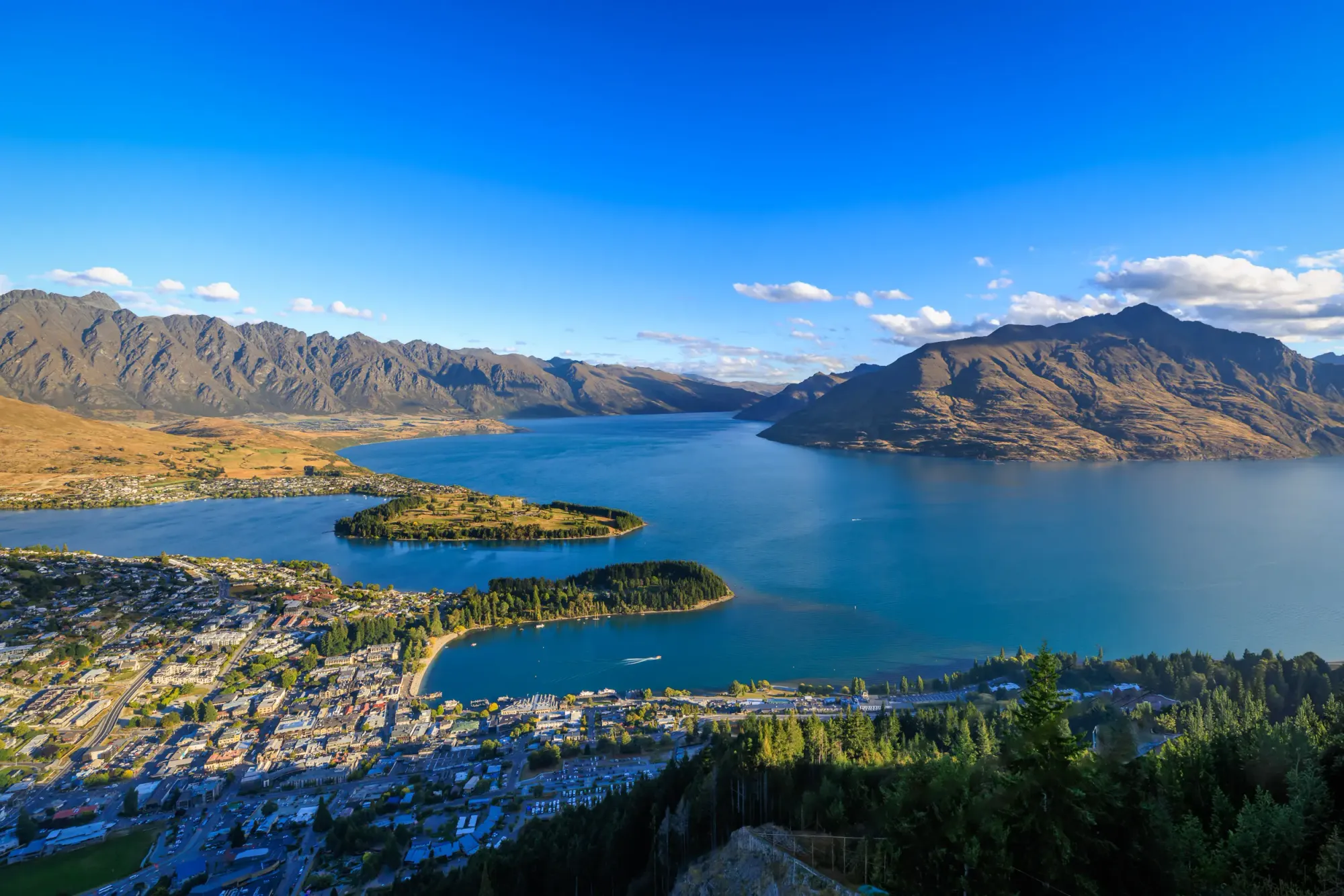 Queenstown sits lightly on the edge of Lake Wakatipu.