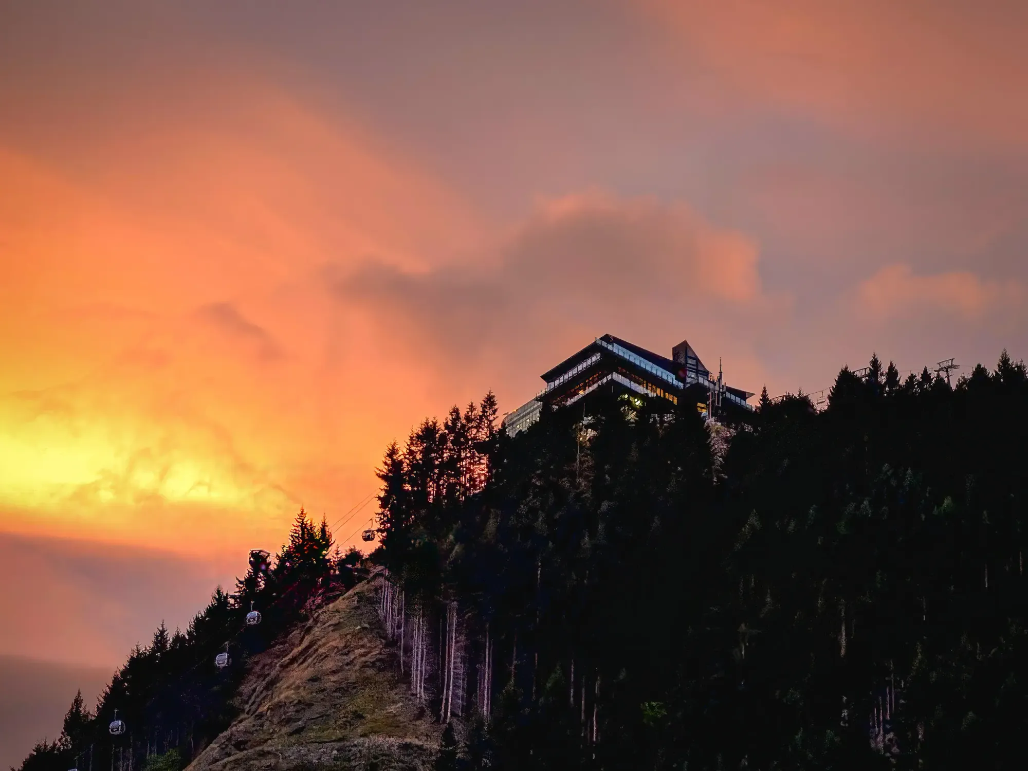 Outside a laundromat in Queenstown, I looked up and saw the Skyline Gondola climbing into a sky that had turned from gold to fire. Even the most ordinary errands here unfold against something extraordinary.